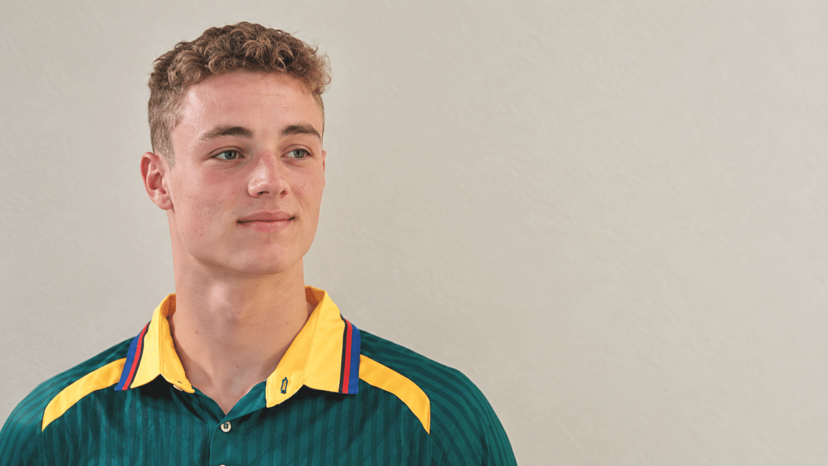 JJ Basson, the young South African left-arm fast bowler, posing in his cricket jersey.