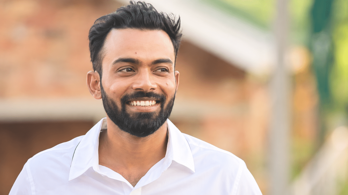 Towhid Hridoy, Bangladesh right-handed batter, smiling in a white shirt.