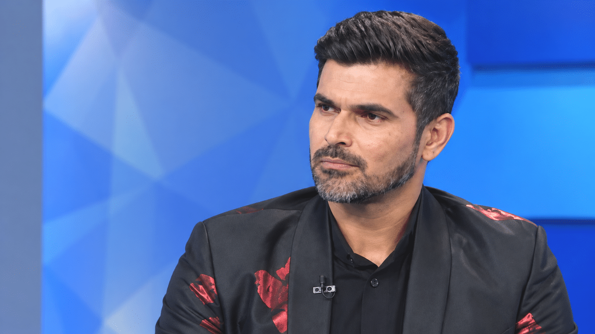 Subramaniam Badrinath, former Indian right-handed batter, wearing a black blazer and looking to the right. citeturn0search6